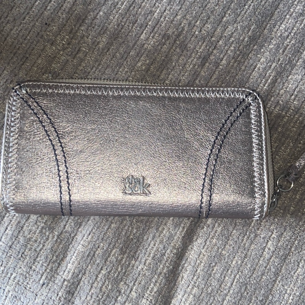 The Sak silver zip wallet